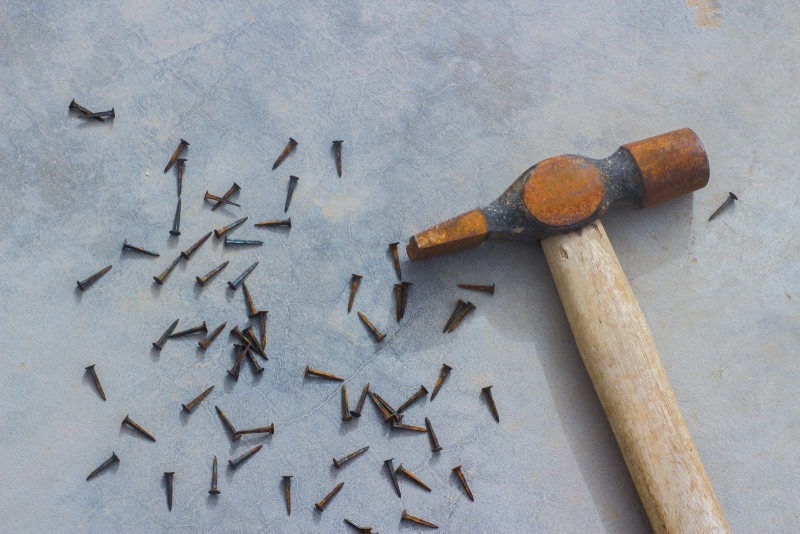 Photograph of a hammer and some nails, referencing Maslow&rsquo;s Hammer
