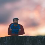 Funko Superman in shallow focus as a hero